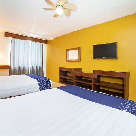 Capital O Hotel Casa Blanca سيلايا المظهر الخارجي الصورة
