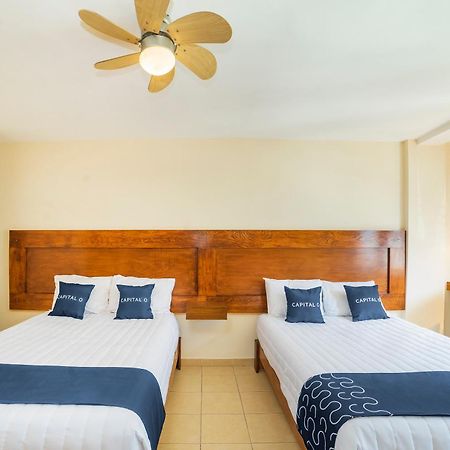 Capital O Hotel Casa Blanca سيلايا المظهر الخارجي الصورة