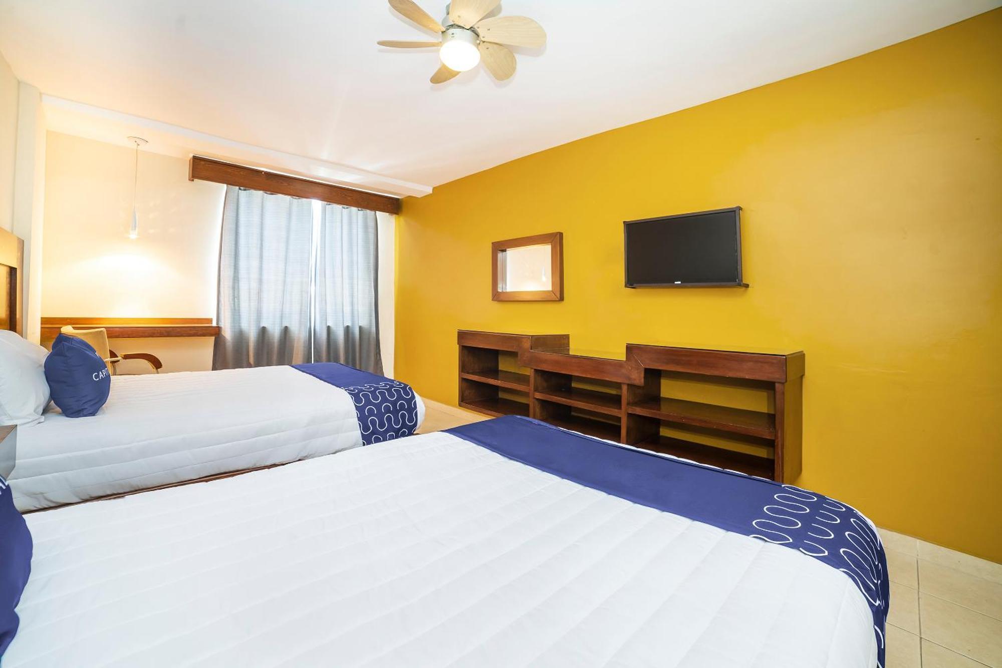Capital O Hotel Casa Blanca سيلايا المظهر الخارجي الصورة