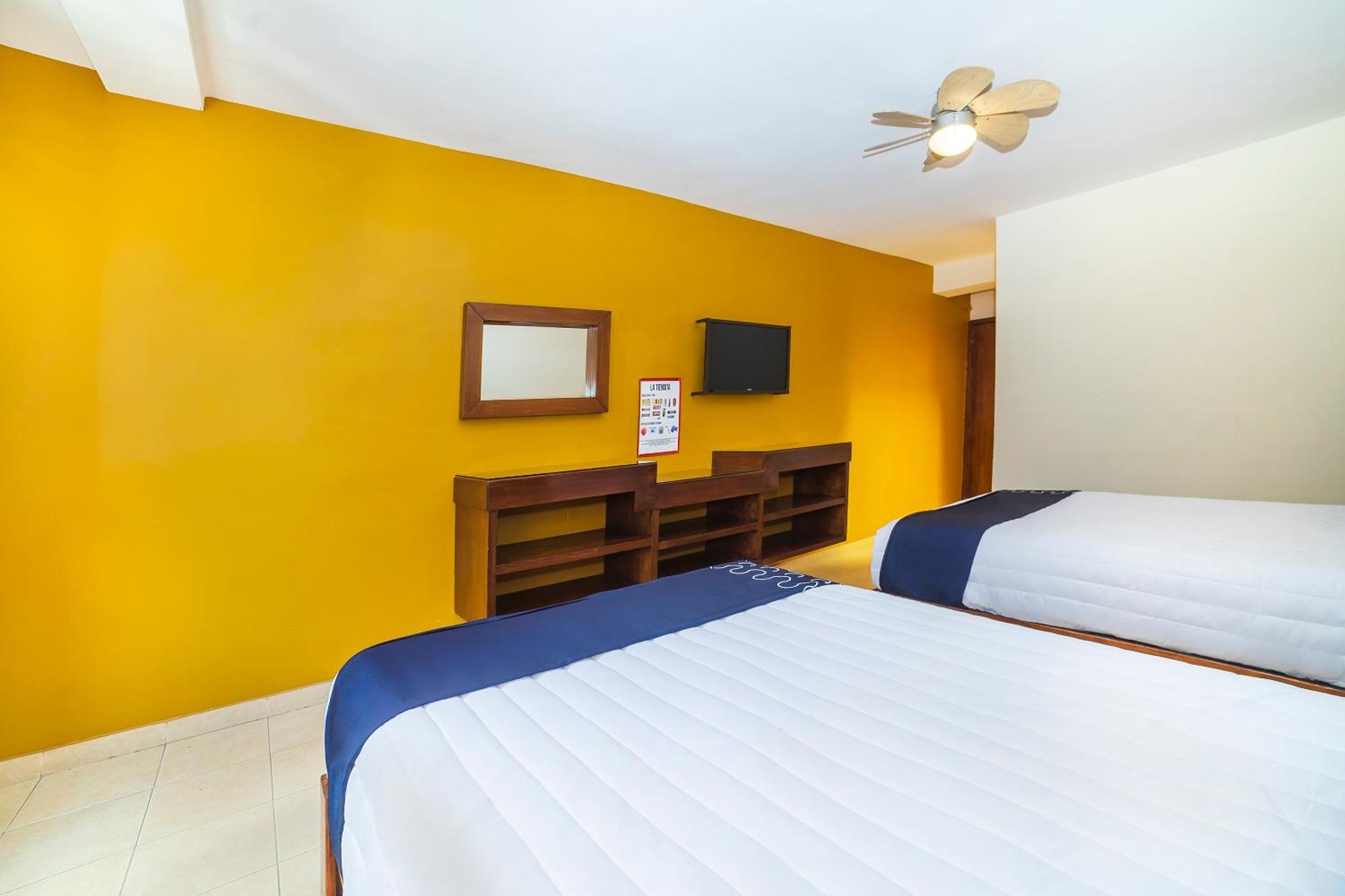 Capital O Hotel Casa Blanca سيلايا المظهر الخارجي الصورة