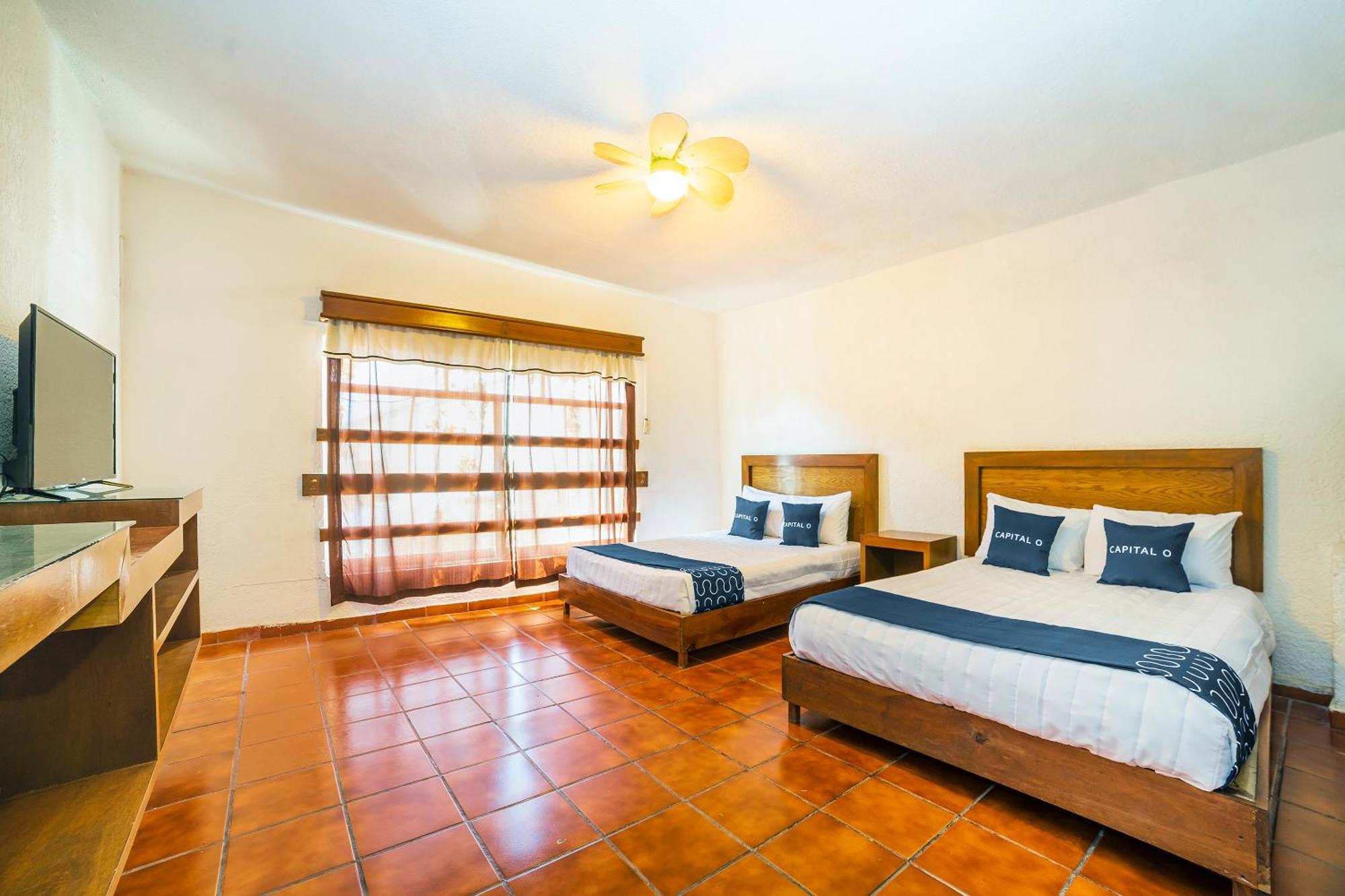 Capital O Hotel Casa Blanca سيلايا المظهر الخارجي الصورة